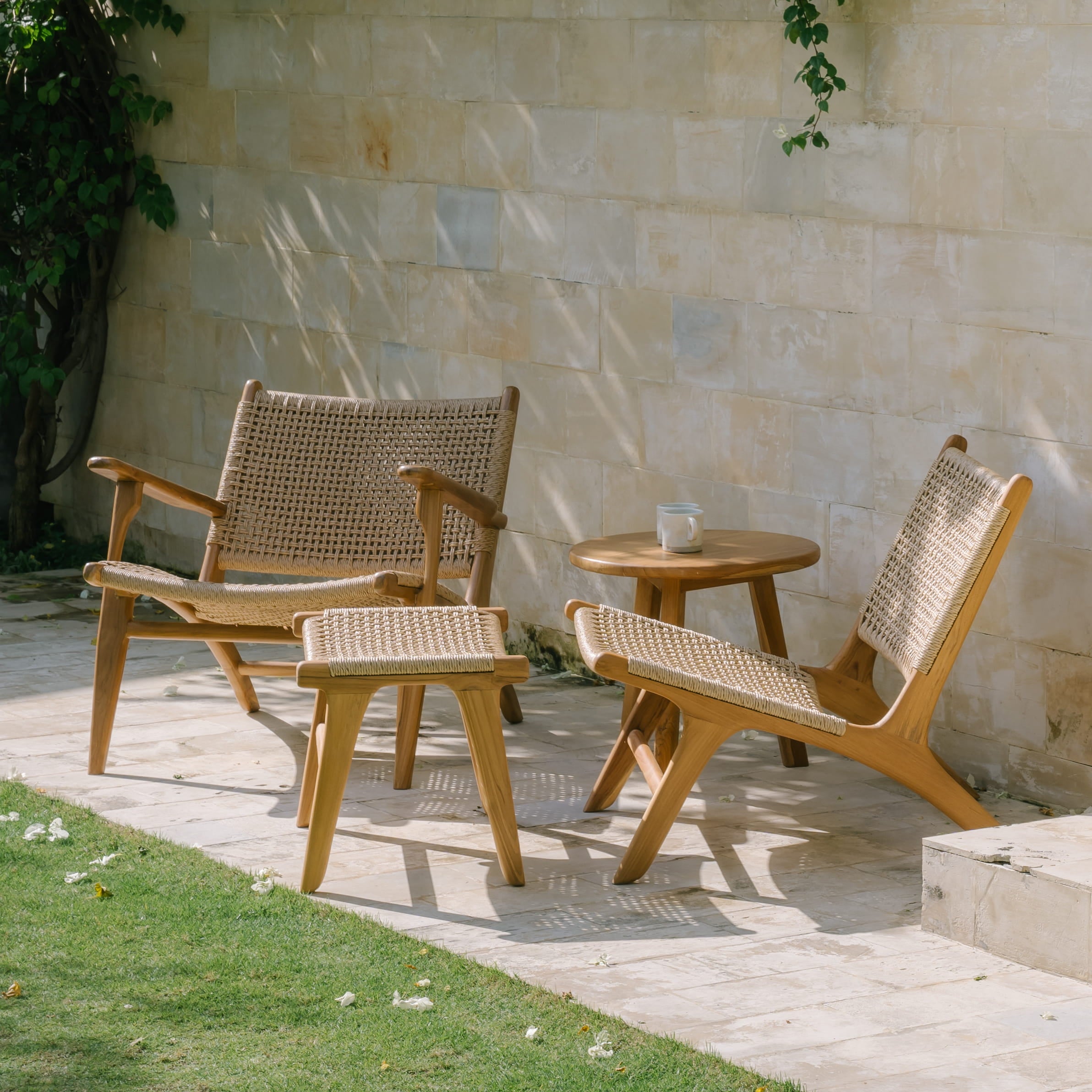 Outdoor setting with rattan accent chairs