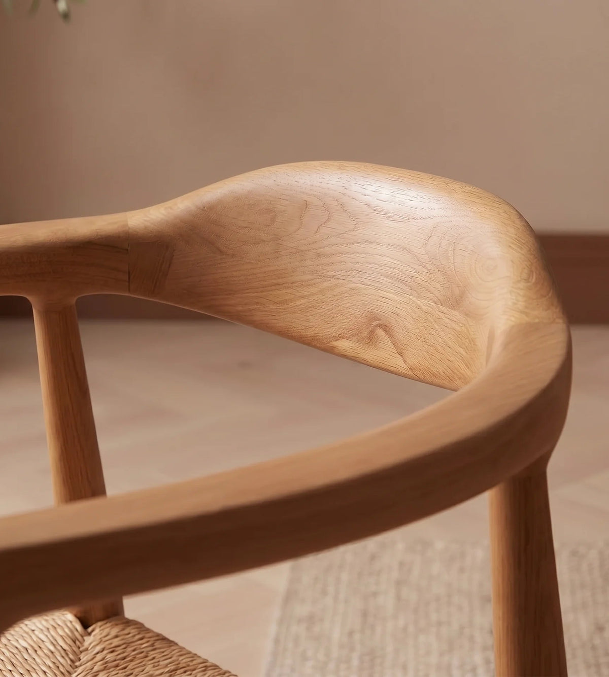 Close-up of a wooden chair with a blurred background