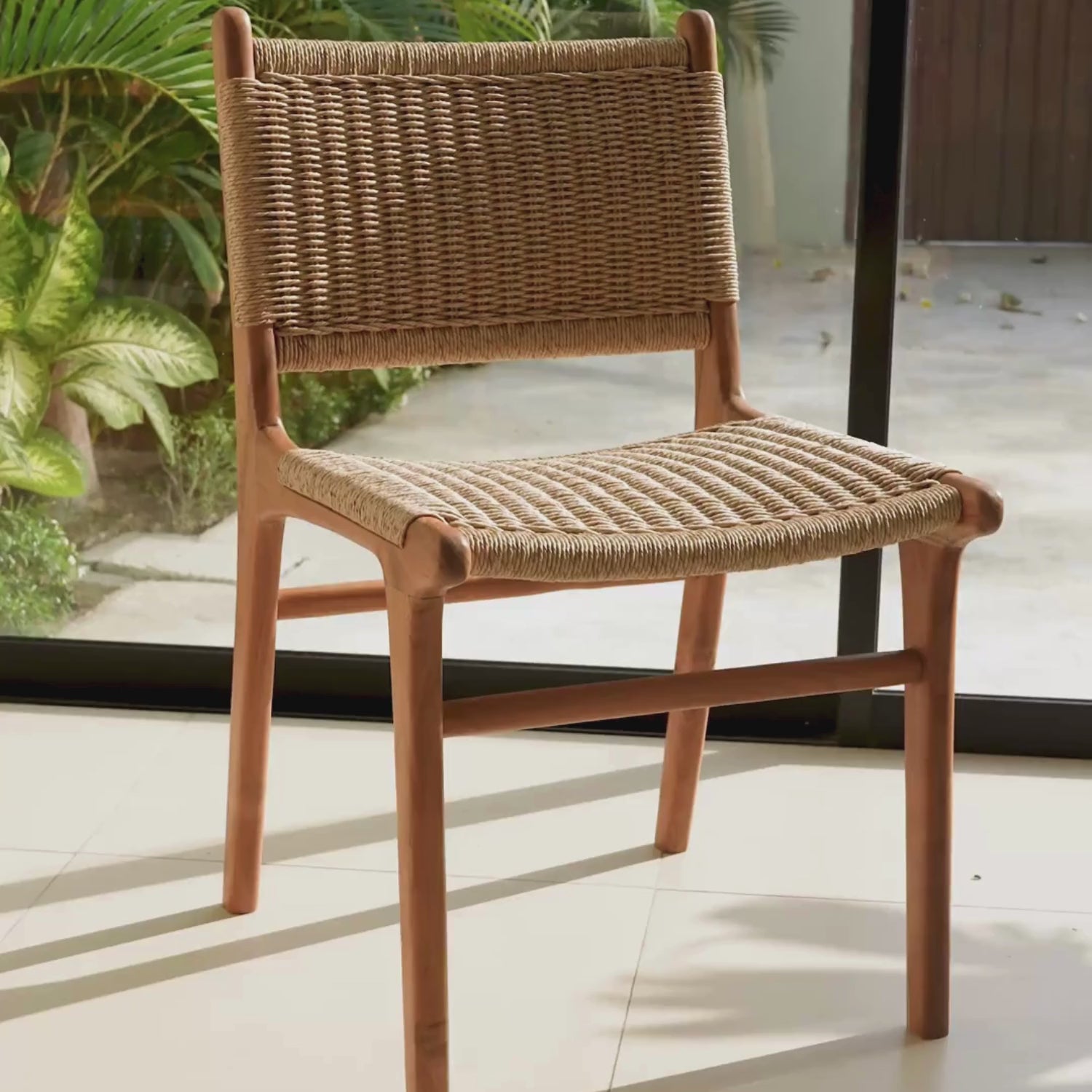 Load video: Zara Rattan Dining Chair