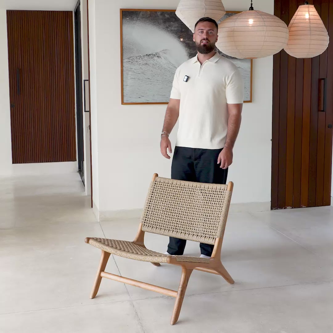 Load video: Zara Teak &amp; Rattan Accent Chair